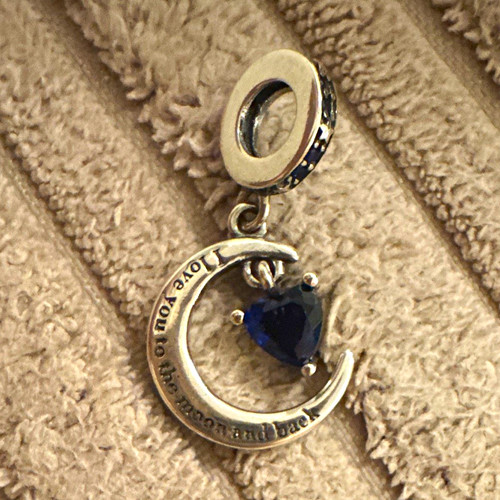 Silver tone crescent - tone,